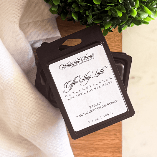 Coffee Shop Latte black clamshell natural wax melts with hazelnut, vanilla bean, and sweet cream for wax melt warmers.