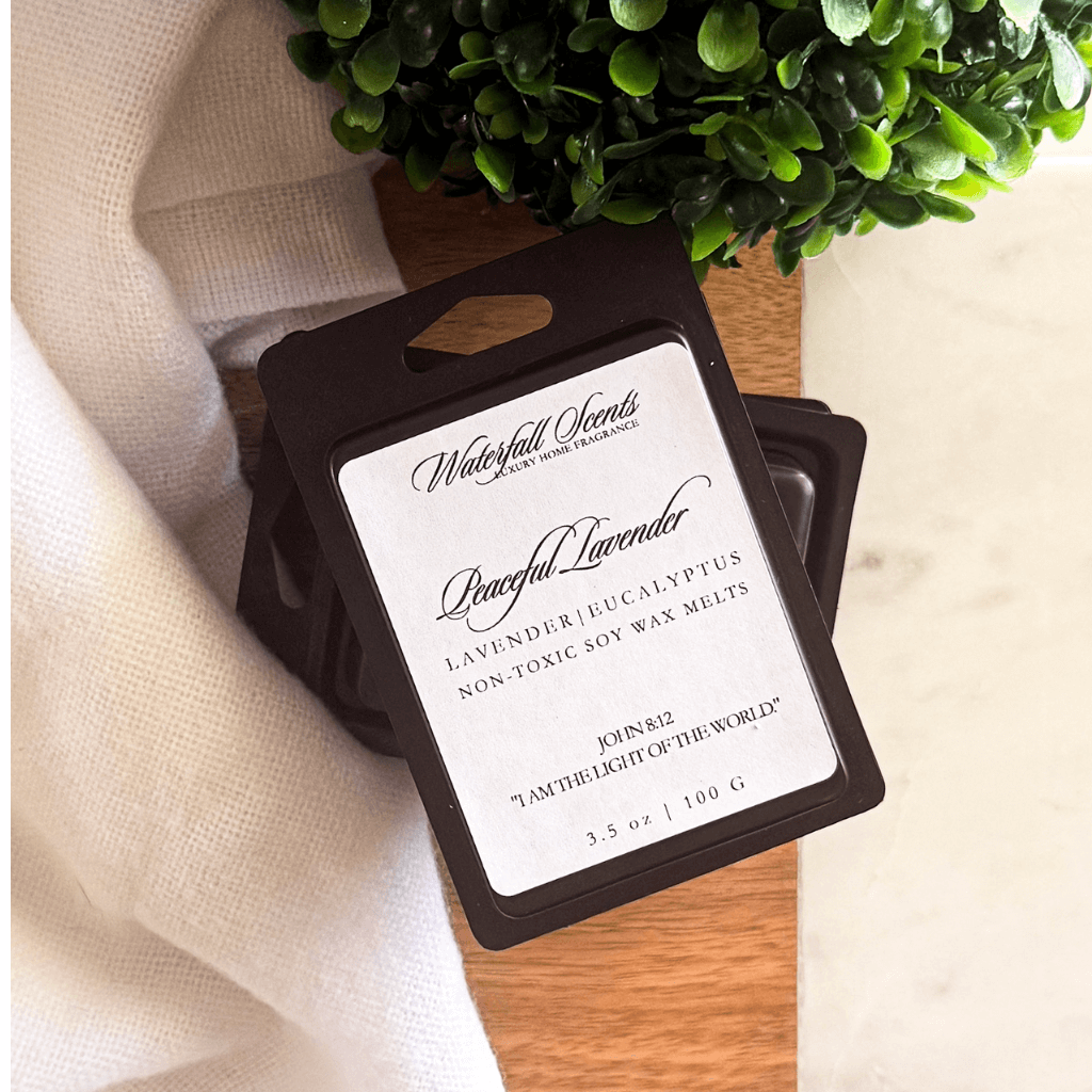 Black clamshell natural wax melts in Peaceful Lavender scent with lavender, eucalyptus, and bergamot, perfect for wax melt warmers.