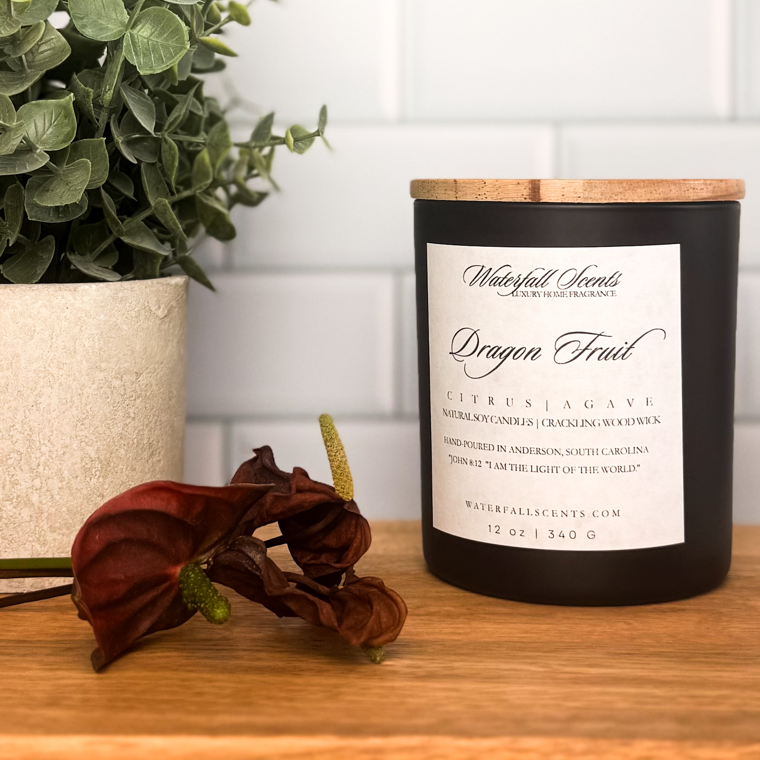 Fruity & Crisp hand poured candle in black glass jar with wooden wick, non-toxic, natural, and clean burning.