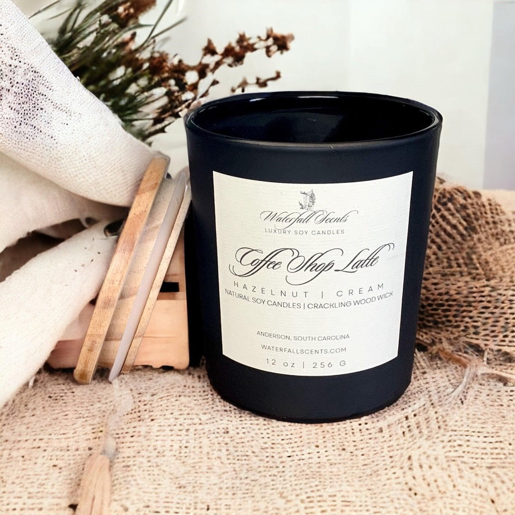 Coffee Shop Latte Wooden Wick Candles - A delightful sight of handcrafted candles, evoking the cozy atmosphere of a favorite coffee shop, come in black glass vessel