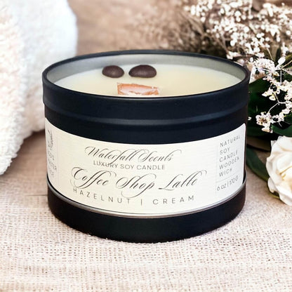 Coffee Shop Latte Wooden Wick Candles - A delightful sight of handcrafted candles, evoking the cozy atmosphere of a favorite coffee shop, come in black tin vessel