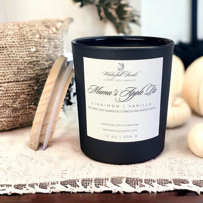  Mama's Apple Pie Wooden Wick Candles - Experience the comforting aroma of freshly baked apple pie with these handcrafted candles, perfect for a cozy atmosphere. Comes in Black Glass Vessel