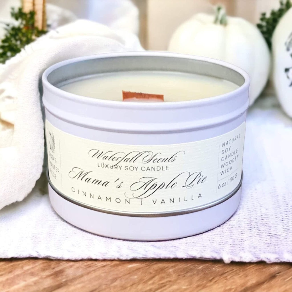 Mama's Apple Pie Wooden Wick Candles - Experience the comforting aroma of freshly baked apple pie with these handcrafted candles, perfect for a cozy atmosphere. Comes in White Tin Vessel