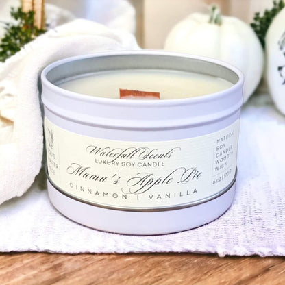 Mama's Apple Pie Wooden Wick Candles - Experience the comforting aroma of freshly baked apple pie with these handcrafted candles, perfect for a cozy atmosphere. Comes in White Tin Vessel