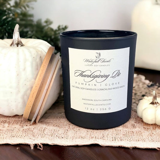 Thanksgiving Pie Wooden Wick Candles - Embrace the spirit of Thanksgiving with these handcrafted candles, capturing the warm and inviting scents of holiday pies. Comes in Black Glass Vessels