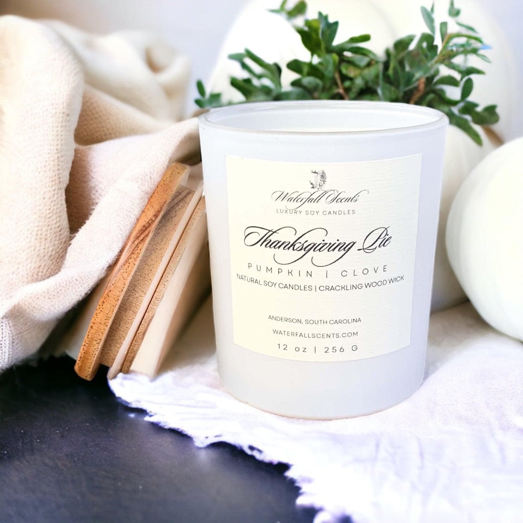 Thanksgiving Pie Wooden Wick Candles - Embrace the spirit of Thanksgiving with these handcrafted candles, capturing the warm and inviting scents of holiday pies. Comes in White Glass Vessels