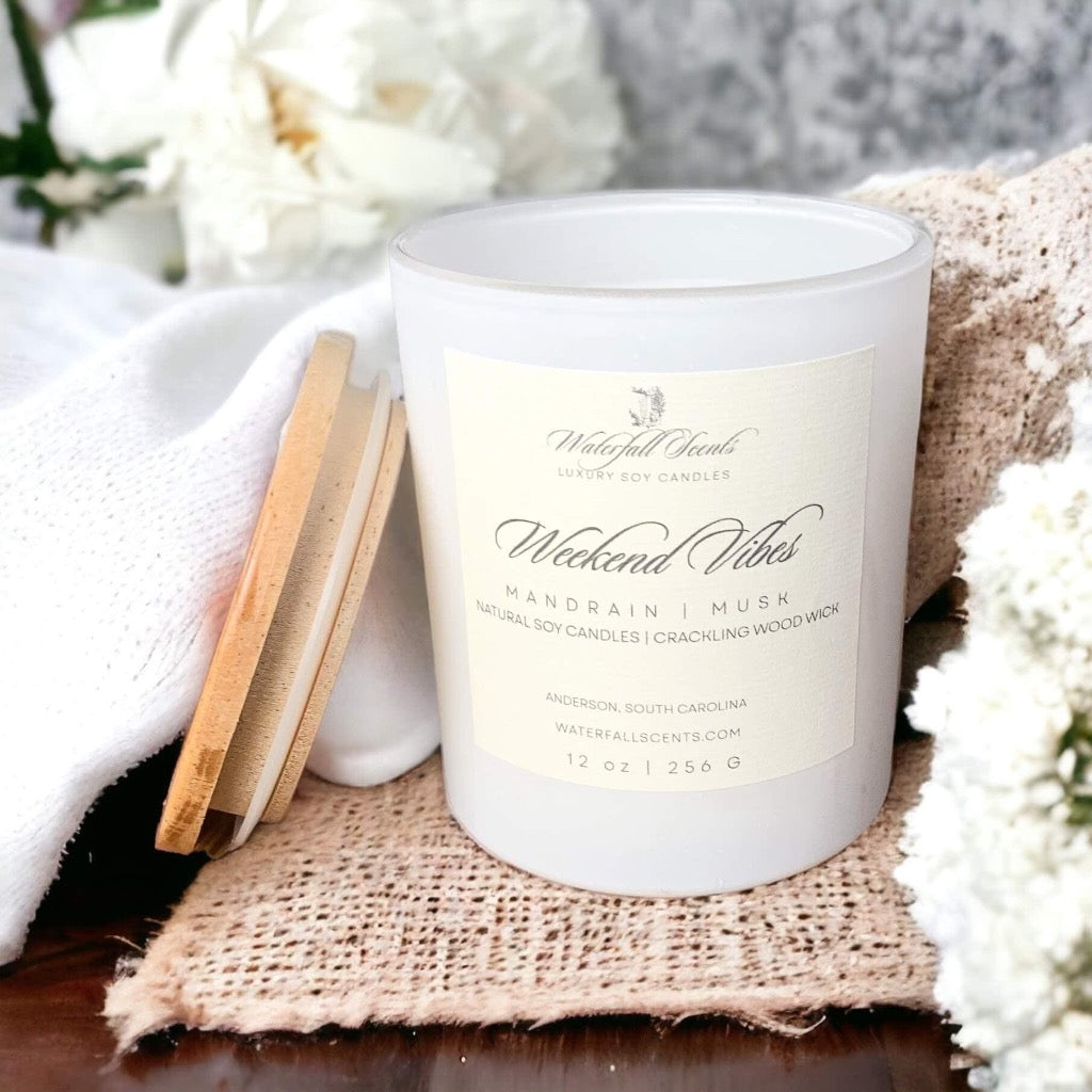  Vibes Wooden Wick Candles - A visual treat of handcrafted candles, setting the tone for a relaxing and rejuvenating weekend getaway at home. Comes in white glass vessels.